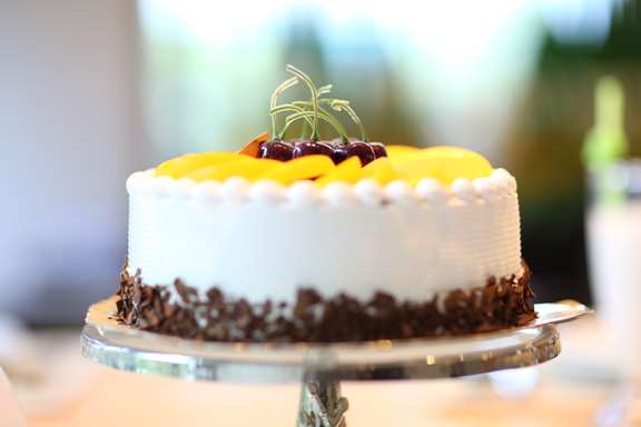 Chocolate Meringue Cake With Whipped Cream and Raspberries Recipe